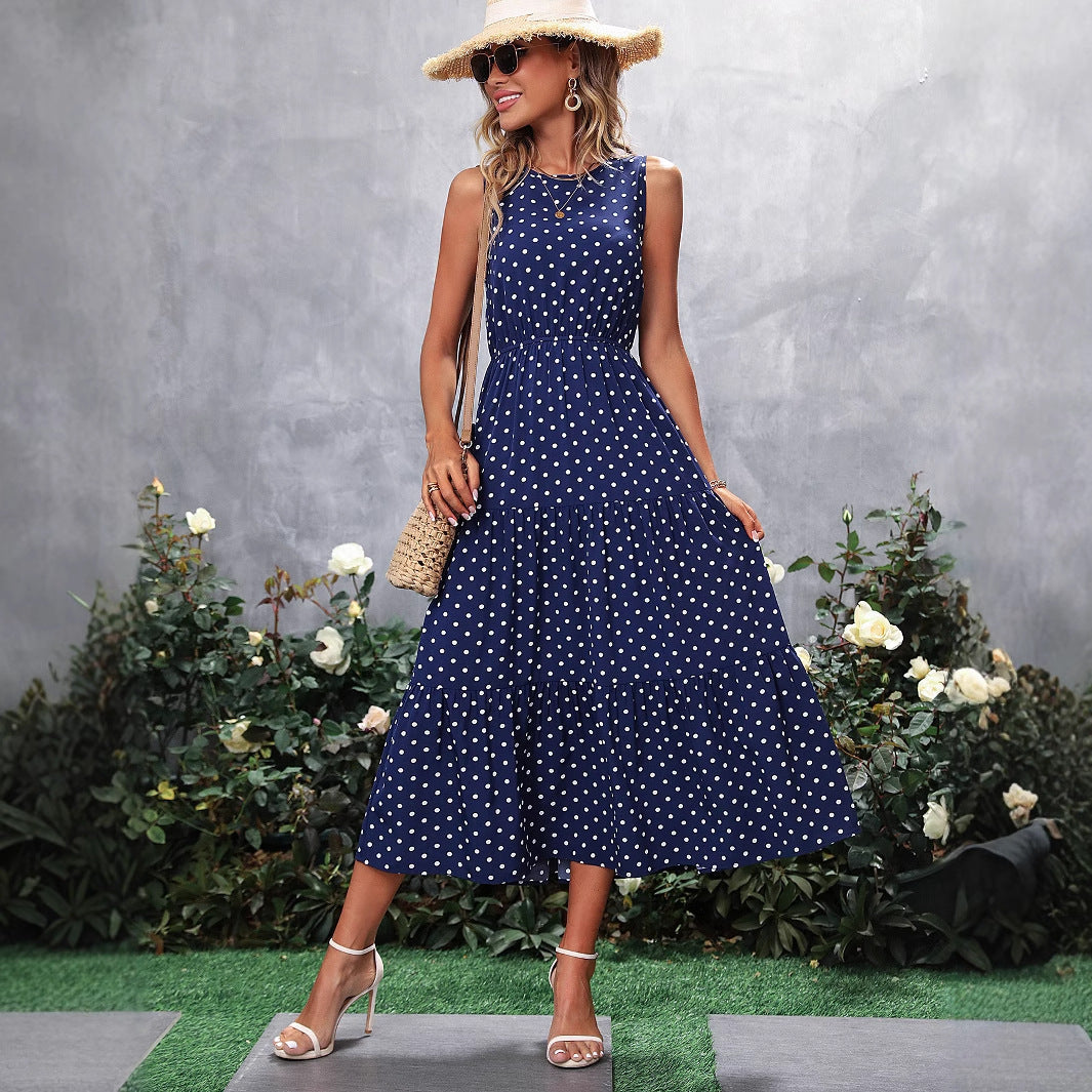 Damen Maxikleid mit Punkten und voluminösem Saum Shopnory