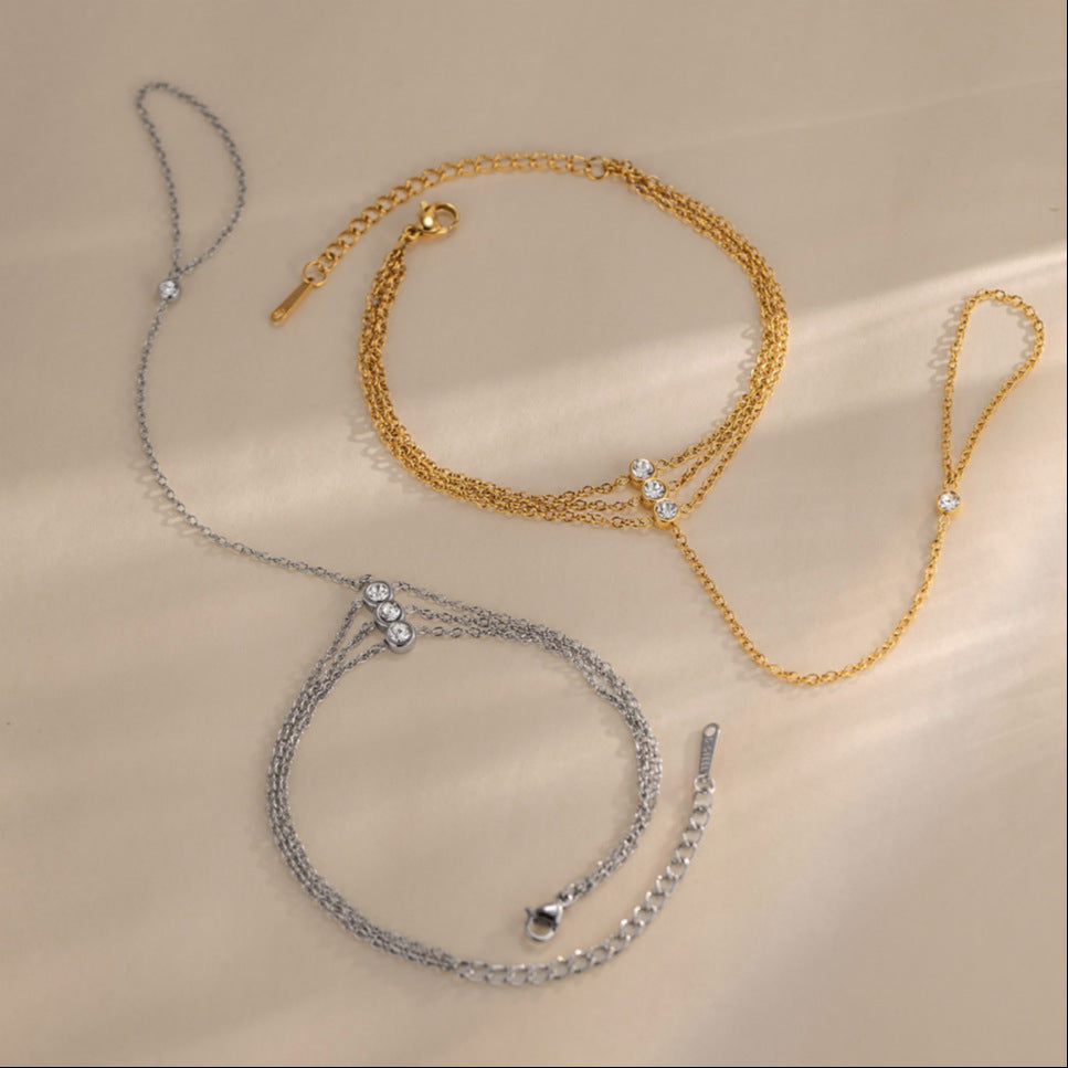 Damen Edelstahlarmband mit funkelnden Kristallakzenten Shop Nory