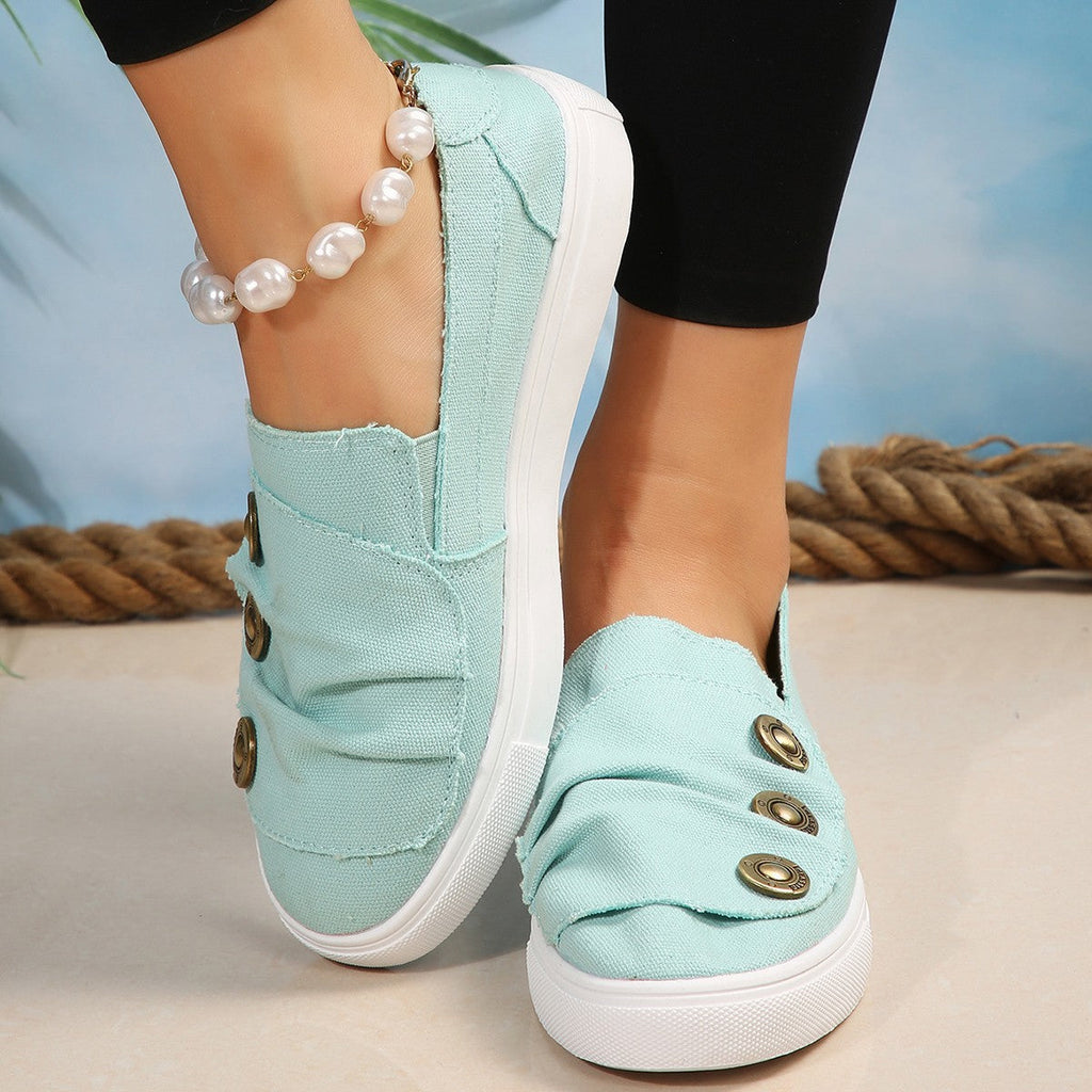 Damen Slip-On Sneakers mit modischen Knopfdetails