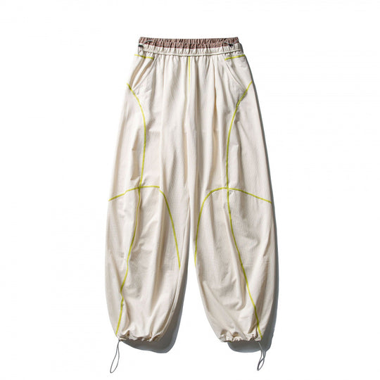 Unisex Locker geschnittene Tech-Jogginghose mit elastischem Bund, markanten Flatlock-Nähten und Kordelzug Shop Nory