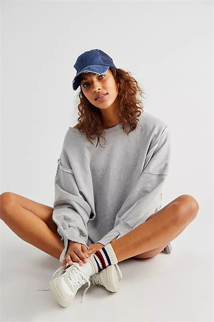 Damen oversized Sweatshirt mit Ballonärmeln, offenen Saumnähten und seitlichen Schlitzen Shop Nory
