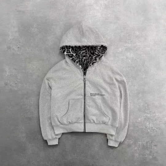 Unisex Kapuzen-Sweatjacke mit Kunstfellfutter, verkürztem Schnitt und Kreuz-Reißverschluss Shop Nory