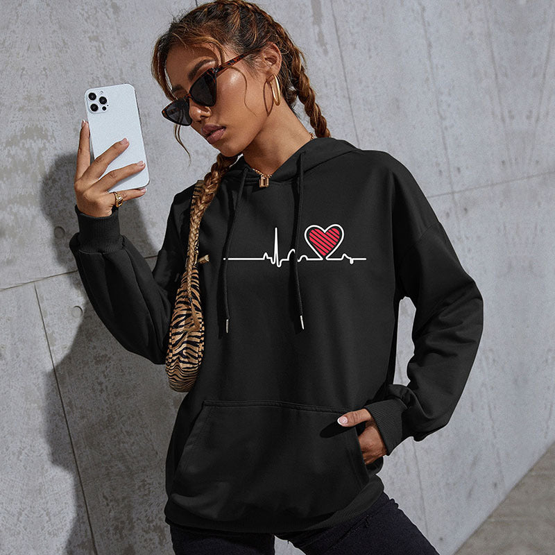 Damen Oversize-Kapuzenpullover mit Herz-EKG‑Print und Kängurutasche Shop Nory