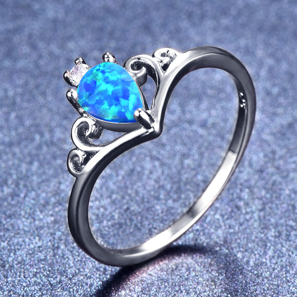 Damen Ring mit filigranem Design und schimmerndem Opal Shop Nory