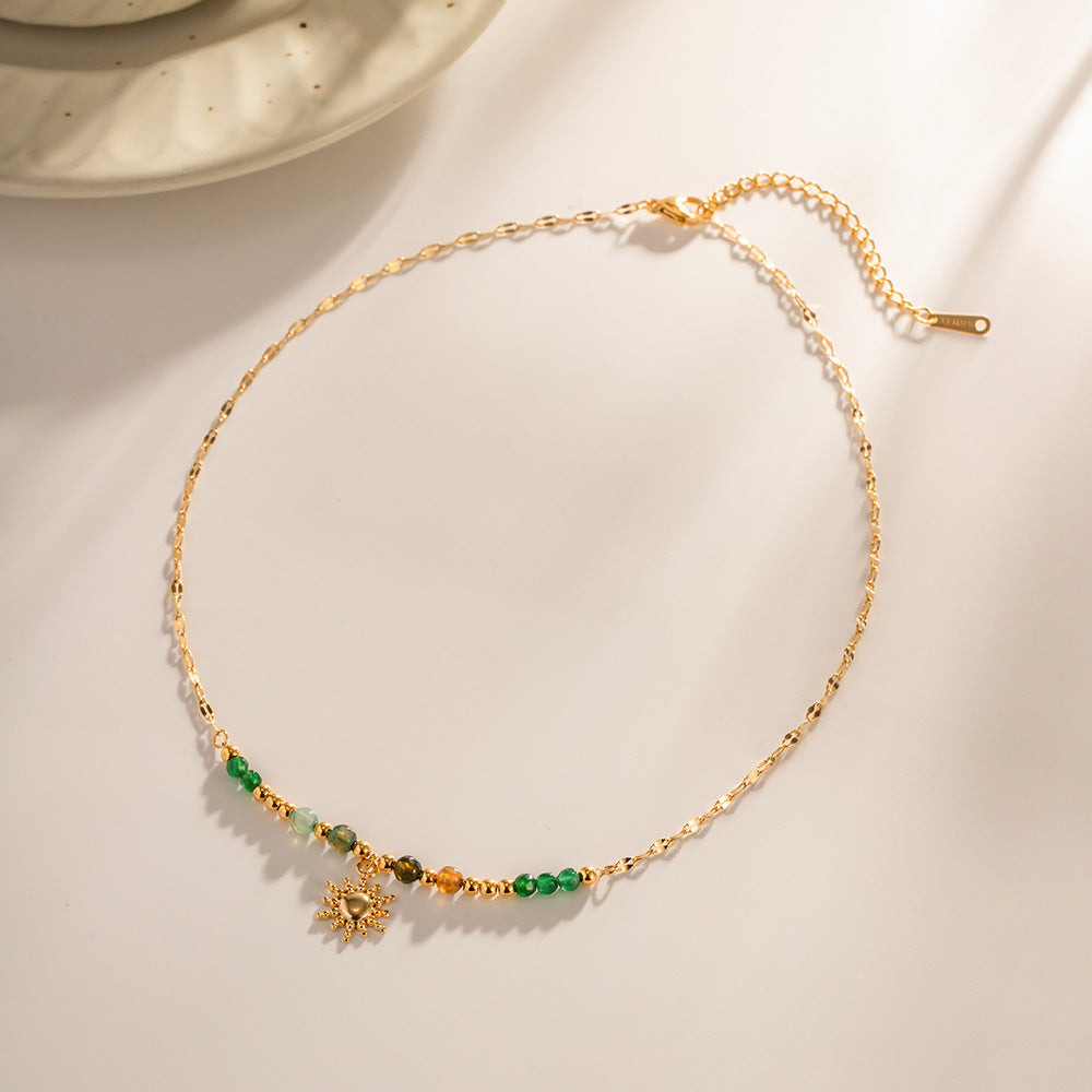 Damen Halskette mit farbigen Edelsteinen und goldener Sonnenanhänger Shop Nory