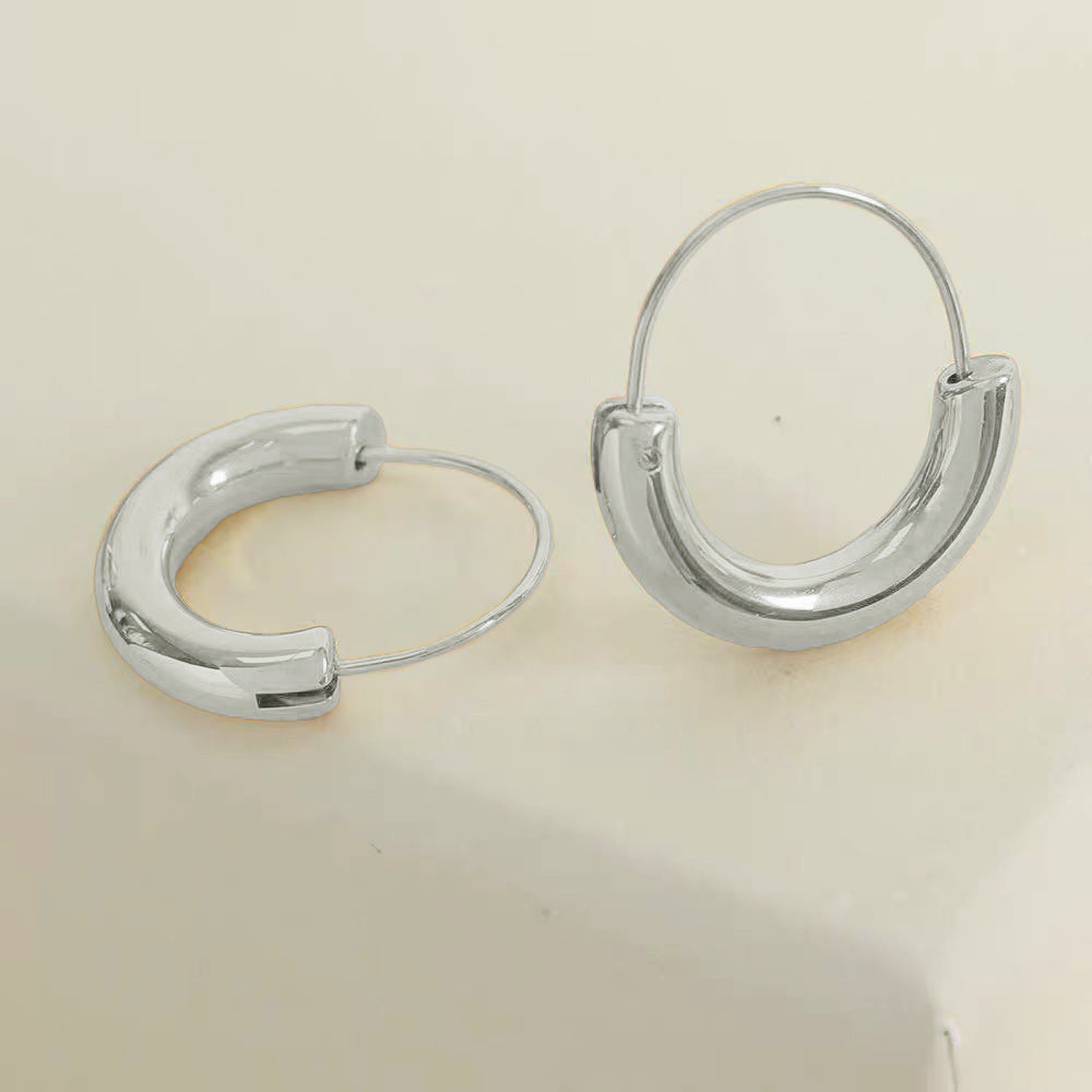 Damen zeitgenössische skulpturale Creolen Shop Nory