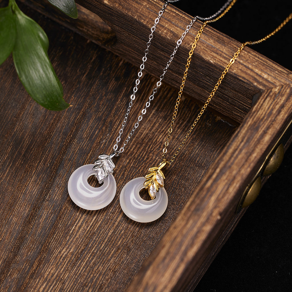 Damen Halskette mit elegantem Donut-Anhänger und zarten Kristallverzierungen Shop Nory