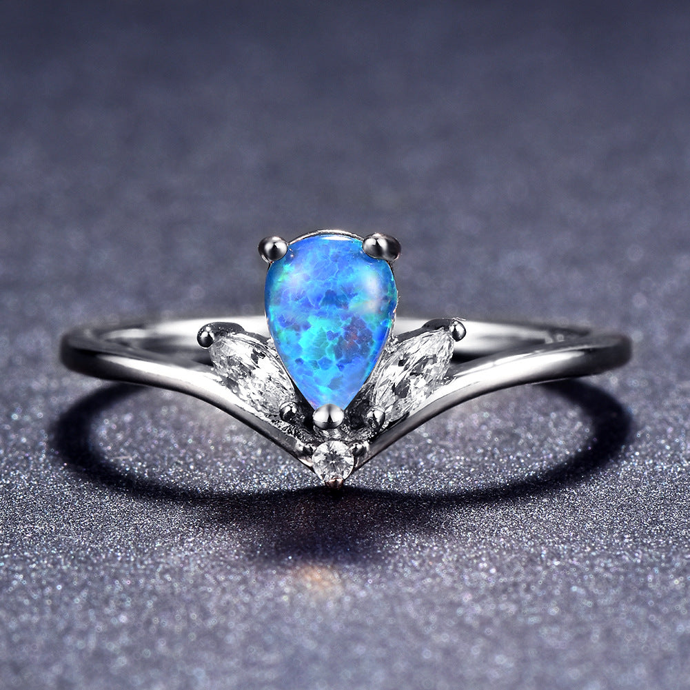 Damen Ring mit elegantem tropfenförmigem Opal und funkelnden Zirkonia Shop Nory