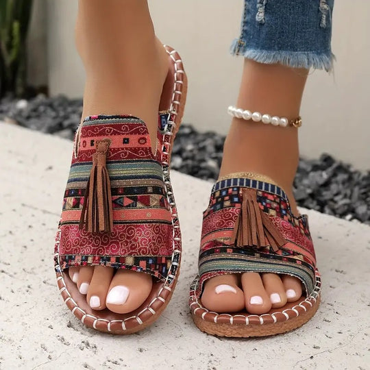 Damen Ethno-Slipper-Sandalen mit Quaste und handgenähter Ziernaht Shop Nory