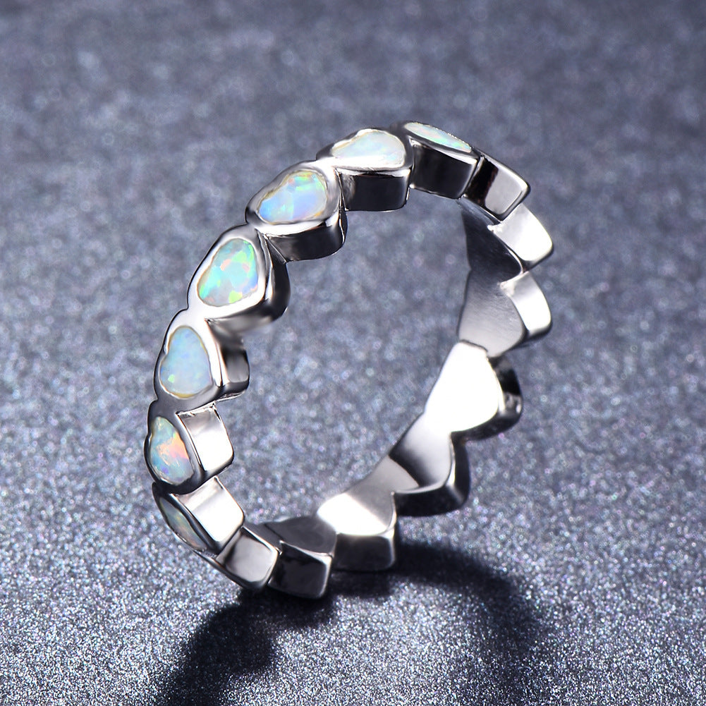 Damen Ring mit schillernden Opalsteinen und eleganter Edelstahlfassung Shop Nory