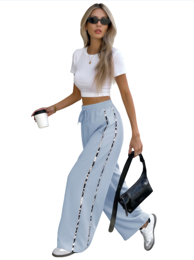 Damen Weite High‑Waist Loungehose mit Kordelzug und kontrastierenden Seitenstreifen Shop Nory