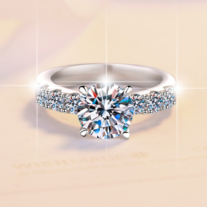 Damenring mit strahlendem Hauptstein und glamourösem Zirkonia-Besatz Shop Nory