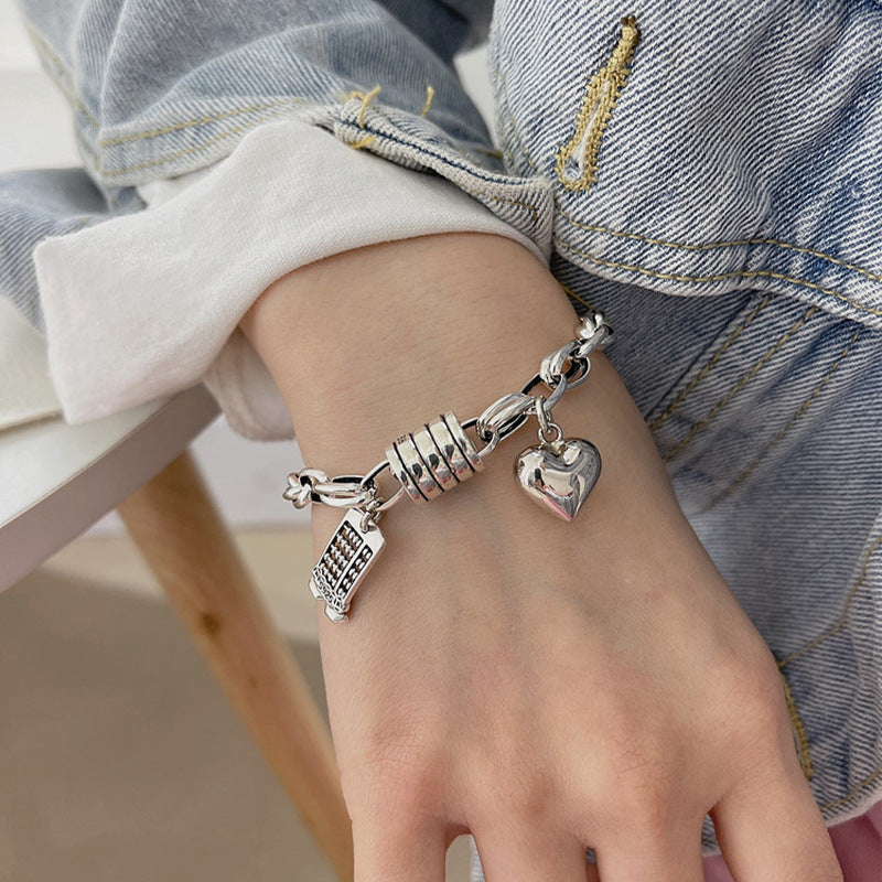 Damenarmband mit charmanten Anhängern Shop Nory