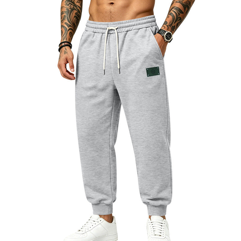 Herren lässig geschnittene Sweat-Jogginghose mit elastischem Bund, Kordelzug und Bündchen Shop Nory