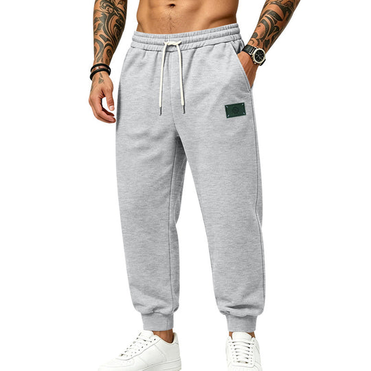 Herren lässig geschnittene Sweat-Jogginghose mit elastischem Bund, Kordelzug und Bündchen Shop Nory