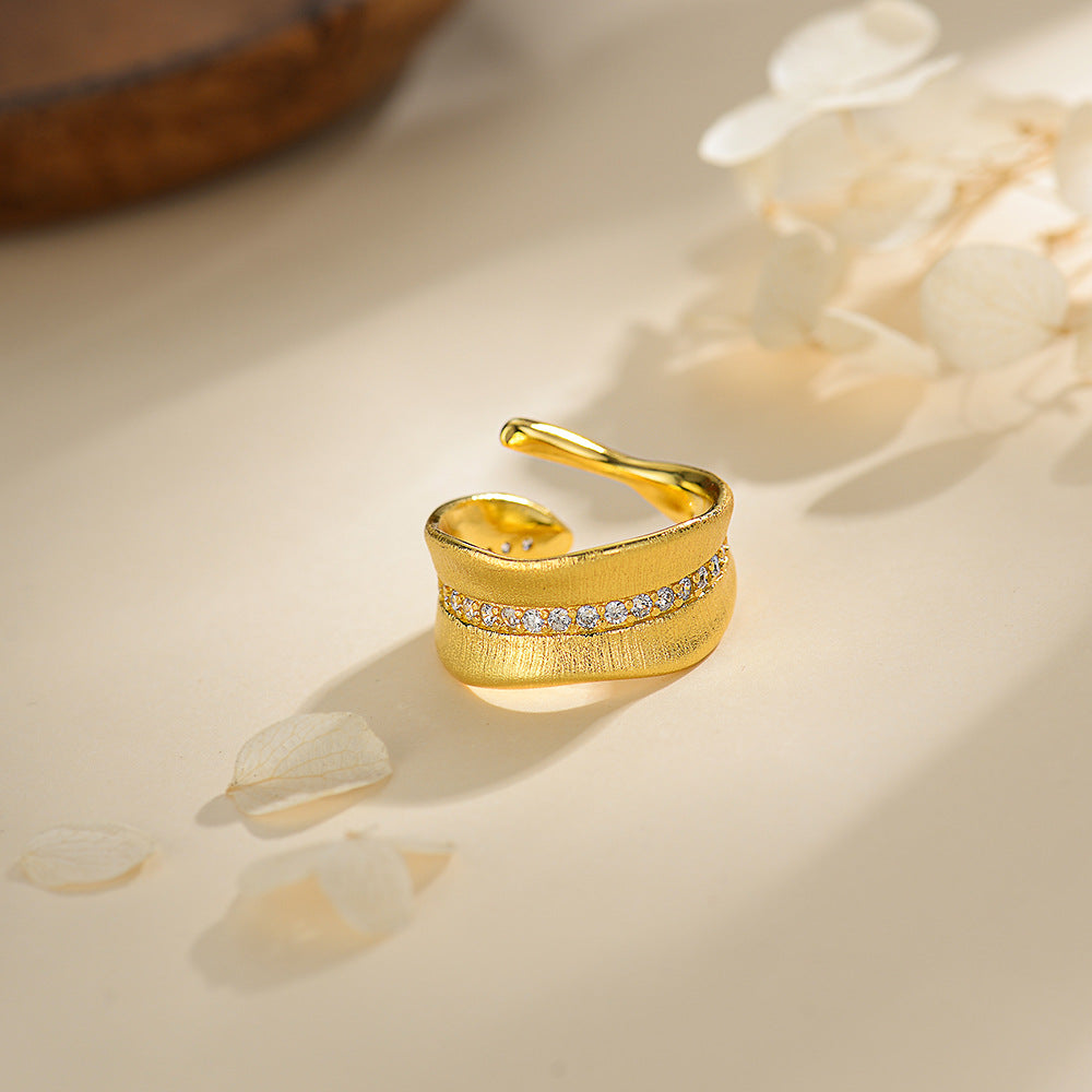 Damen Ring mit funkelndem Zirkonia und geschwungenem Design Shop Nory