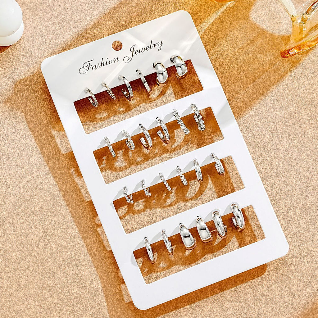 Damen Creolen Ohrringe Set mit vielfältigen Designs und funkelnden Akzenten Shop Nory