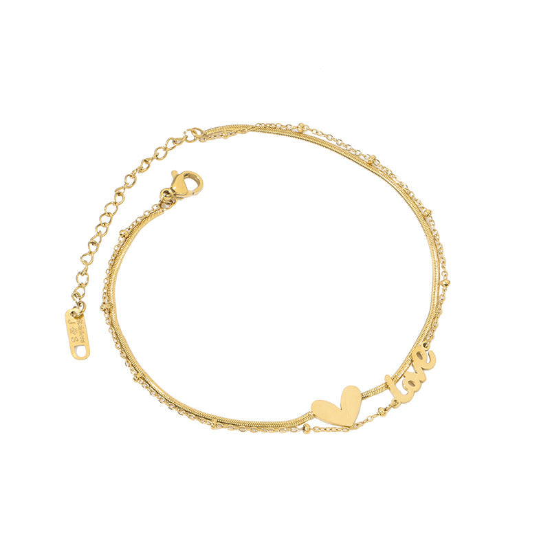 Damen Armkette mit verspieltem Herz- und Schriftzugdesign Shop Nory