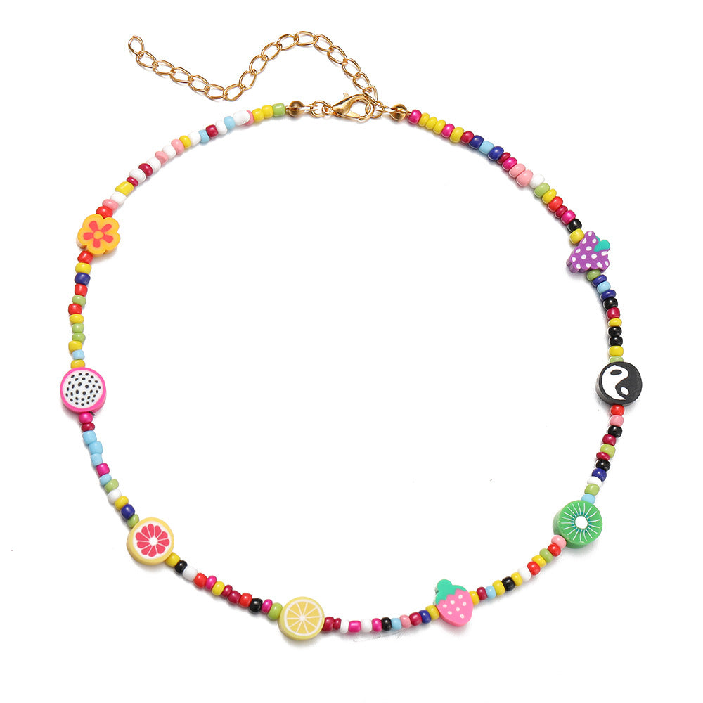 Damen Halskette mit bunten Blumenelementen und eleganten Perlen Shop Nory