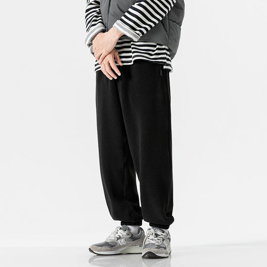 Herren Weit geschnittene Fleece-Jogginghose mit elastischen Bündchen und Eingrifftaschen Shop Nory