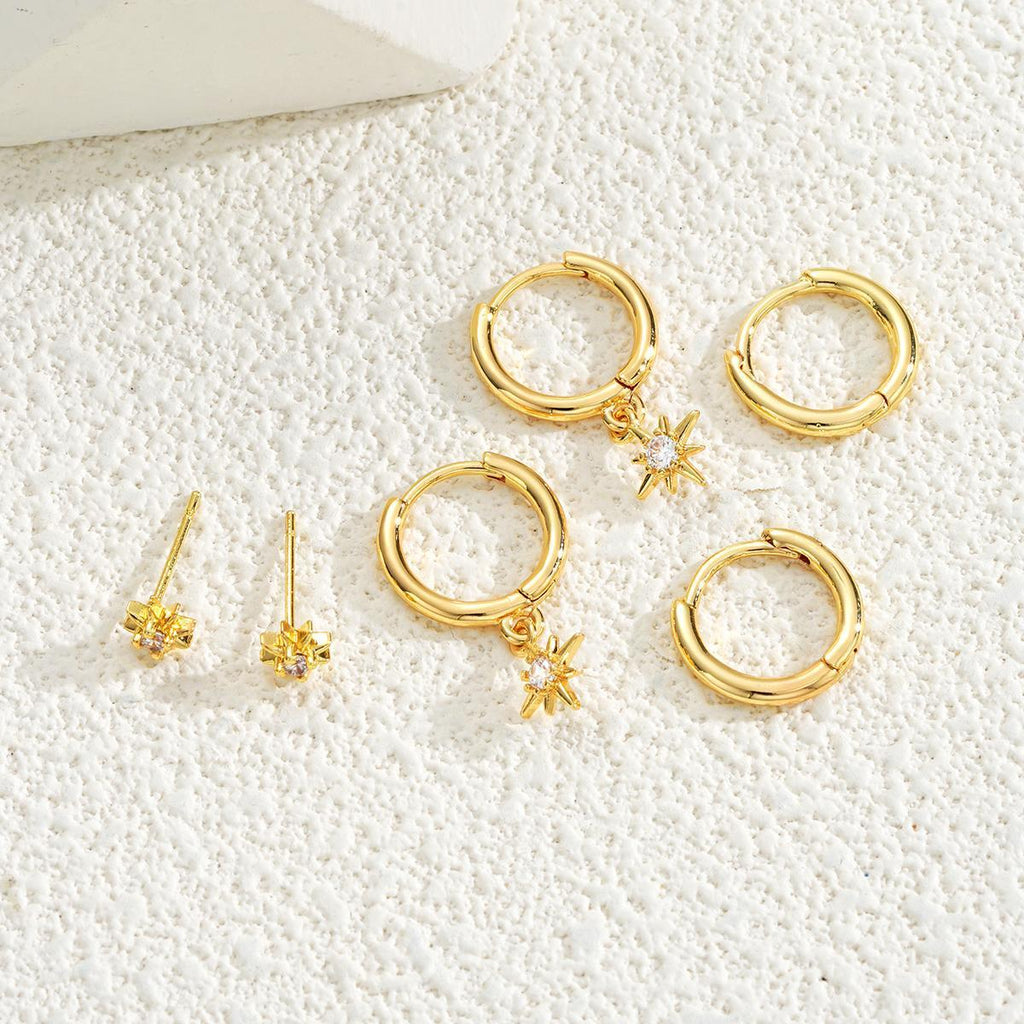 Damen Ohrschmuck mit funkelndem Sternanhänger und eleganten Creolen Shop Nory
