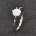 Damen Ring mit funkelndem Opal und eleganter Edelstahlfassung Shop Nory