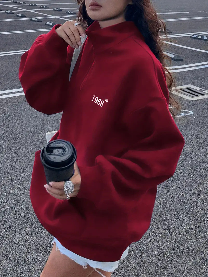 Damen Oversized Sweatshirt mit halbem Reißverschluss, hohem Stehkragen und Kängurutasche Shop Nory