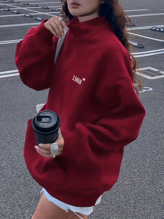 Damen Oversized Sweatshirt mit halbem Reißverschluss, hohem Stehkragen und Kängurutasche Shop Nory