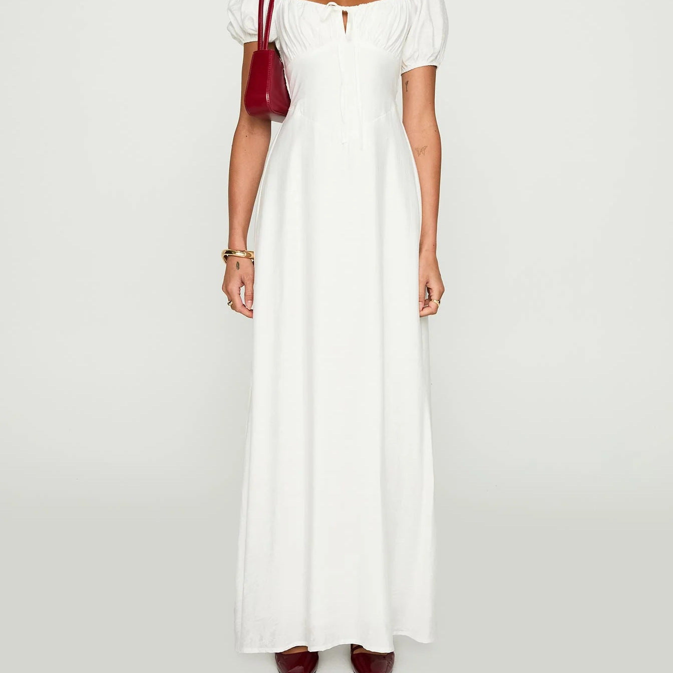 Damen Maxikleid mit Puffärmeln und elegantem Ausschnitt Shopnory