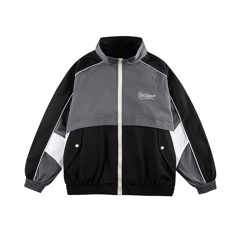 Unisex Kastig geschnittene Trackjacke im Retro-Sportstil mit hohem Stehkragen, Farbblock‑Einsätzen und elastischem Saum Shop Nory