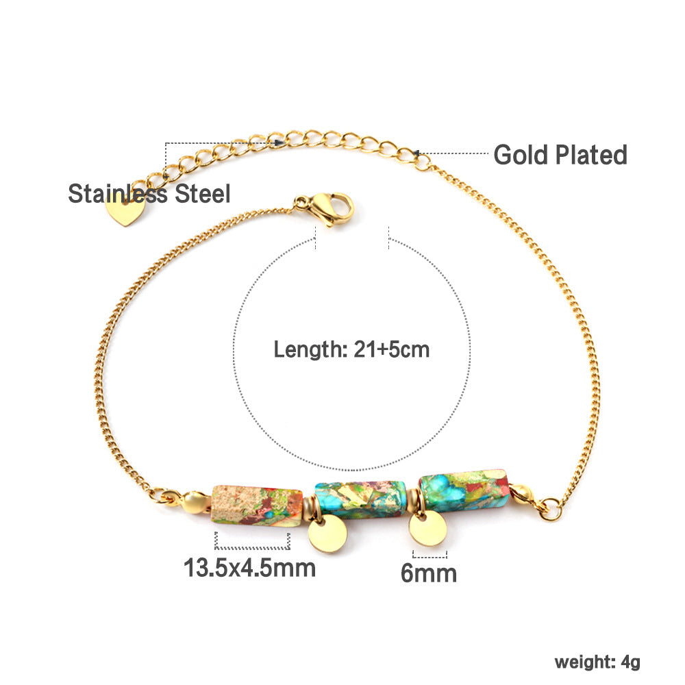 Damen Armband mit funkelnden Karibikstein-Elementen aus hochwertigem Edelstahl und goldplattierten Akzenten Shop Nory