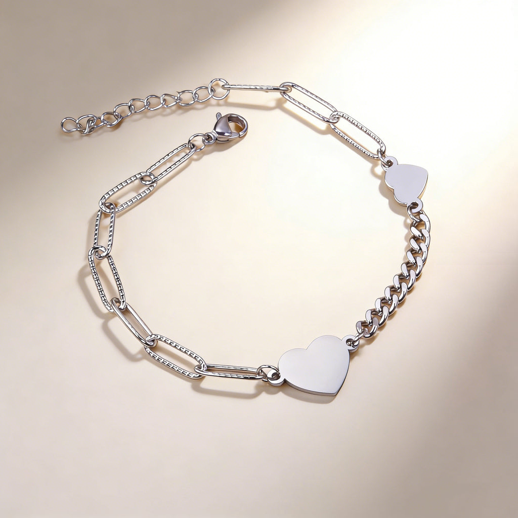 Damen Armband mit herzförmigem Anhänger aus hochwertigem Edelstahl und rosévergoldeter Oberfläche Shop Nory