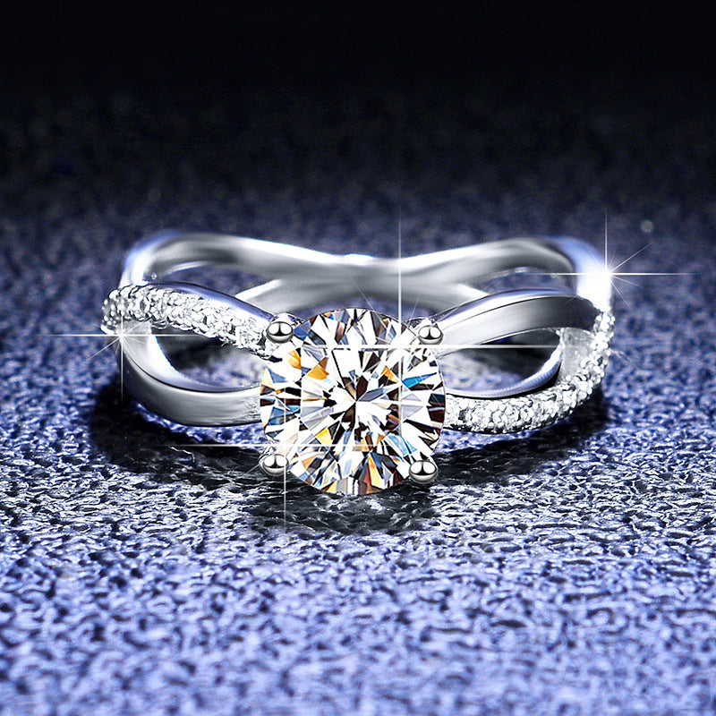 Damen eleganter Schmuckring mit strahlendem Zirkonia und raffinierter Wellenfassung Shop Nory
