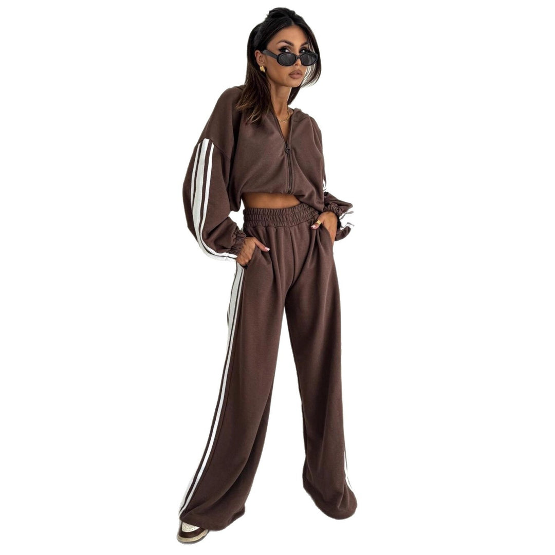 Damen cropped Zip-Hoodie mit voluminösen Ballonärmeln und High-Waist Relaxhose im sportlichen Seitenstreifen-Design Shop Nory