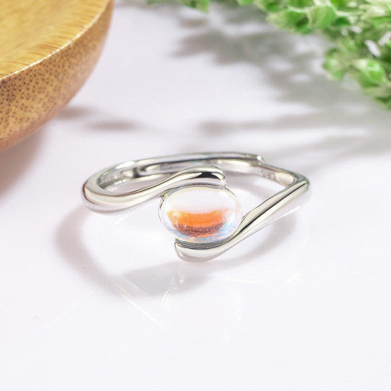 Damen Ring mit elegantem, geschwungenem Design und funkelndem Glasstein Shop Nory