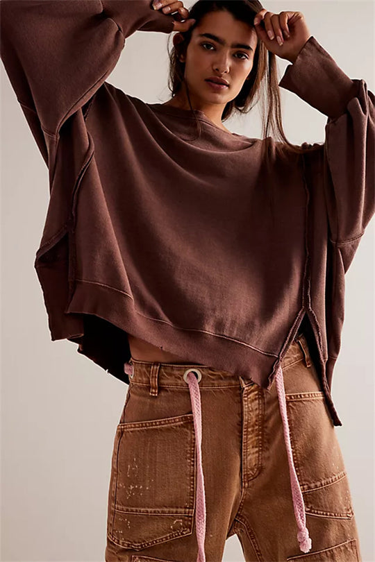 Damen oversized Sweatshirt mit Ballonärmeln, offenen Saumnähten und seitlichen Schlitzen Shop Nory