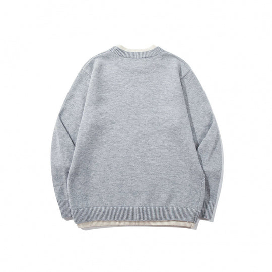 Unisex Feinstrickpullover mit Raglannaht und dreieckigem Saumbesatz Shop Nory