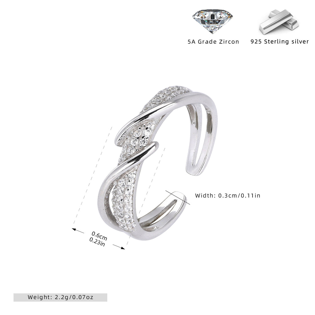 Damen Ring mit geschwungenem Design und funkelndem Zirkonbesatz Shop Nory