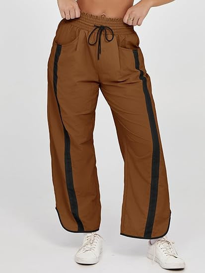 Damen nan relaxte Trackpants mit seitlichem Kontraststreifen, elastischem Smokbund und Eingrifftaschen Shop Nory