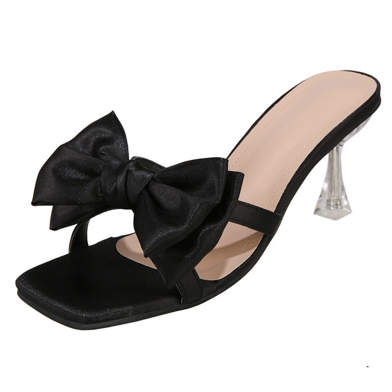Damen High Heel Pantoletten mit eleganter Schleifen-Applikation und glitzerndem Absatz