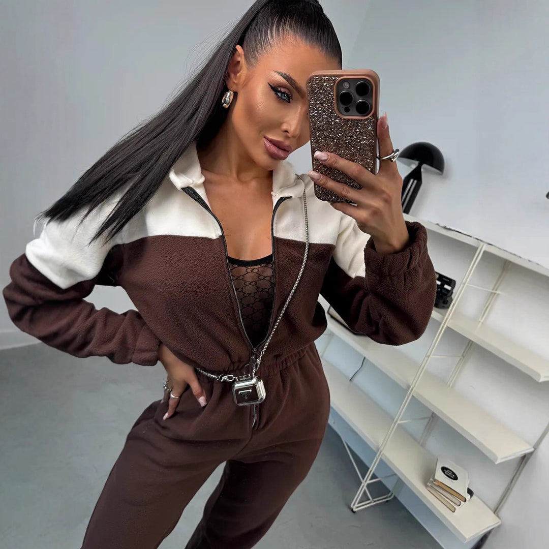 Damen gemütlicher Fleece-Overall mit Kapuze, durchgehendem Reißverschluss und elastischen Bündchen Shop Nory