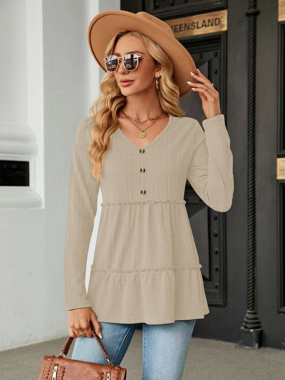Damen Ärmelloses V-Ausschnitt Shirt mit Knopfdetails und voluminösem Saum