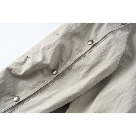 Unisex Kurzblouson im minimalistischen Workwear‑Look mit hohem Stehkragen und Druckknopfverschluss Shop Nory