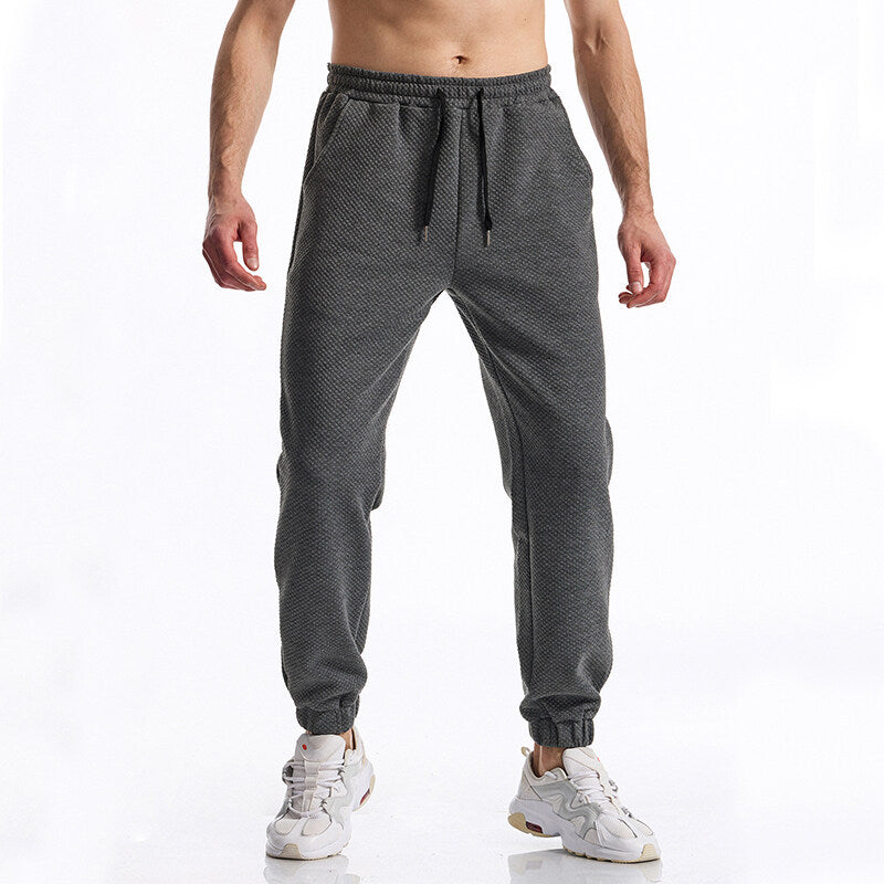 Herren Texturierte Jogginghose mit elastischem Bund, Tunnelzug und gebündeltem Beinabschluss Shop Nory