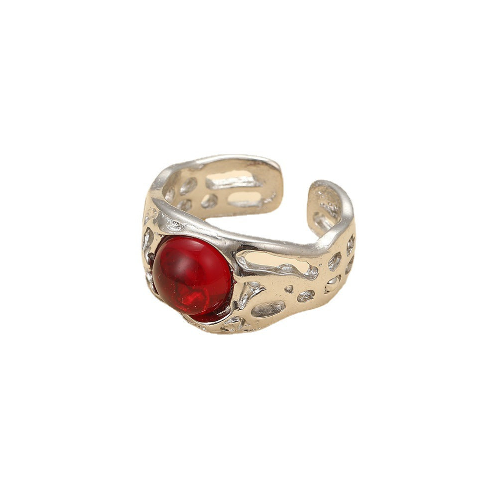 Damenring mit kunstvollem Design und rotem Kristall Shop Nory