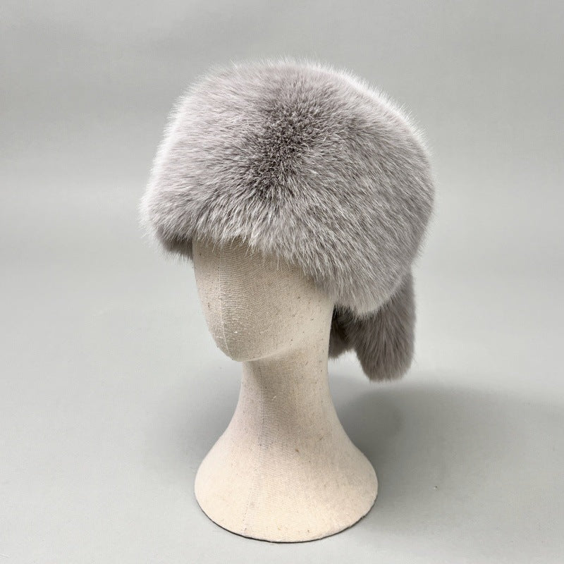 Damen Plüsch-Kunstpelz-Mütze im Trapperstil mit Ohrklappen und dekorativem Schwanz Shop Nory