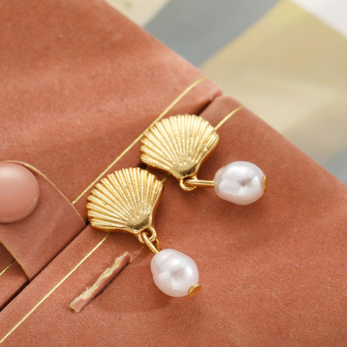 Damen Ohrstecker mit Muschel-Design und Süßwasserperlen Shop Nory