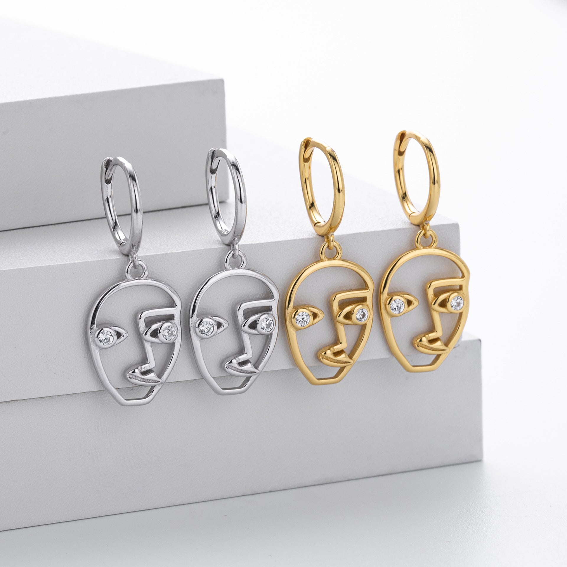 Damen Ohrringe im modernen Gesichtsdesign aus hochwertigem 925 Sterling Silber Shop Nory