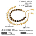 Damen Armband mit goldfarbener Edelstahlkette und charmanten Steinakzenten Shop Nory