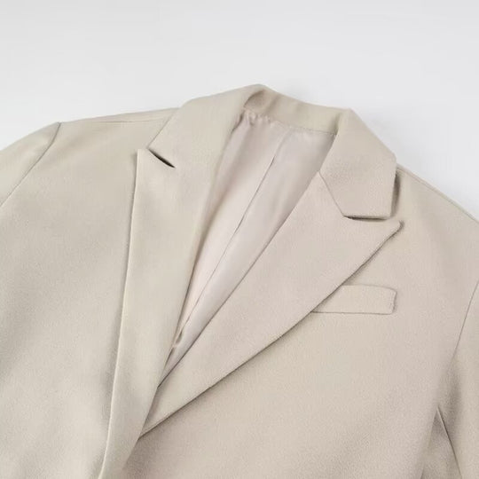 Damen Langmantel mit langem Fransen‑Saum, kastiger Oversize‑Silhouette und Reverskragen Shop Nory